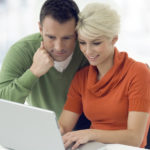 couple looking at computer