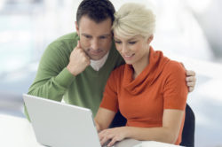 couple looking at computer