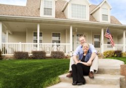 couple in front of home