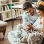 couple looking at phone